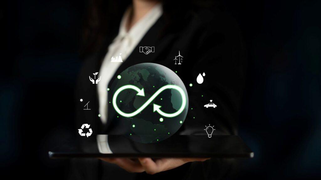 Symbol fuer Nachhaltigkeit und Digitalisierung schwebt ueber Tablet im Kontext der Blechbearbeitung